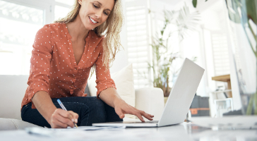 a woman working on her laptop