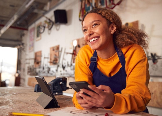 a small business owner smiling