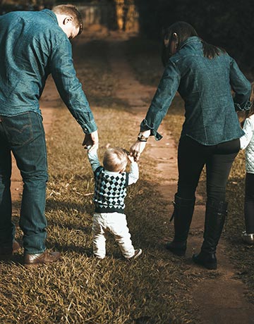 A young family going on a walk